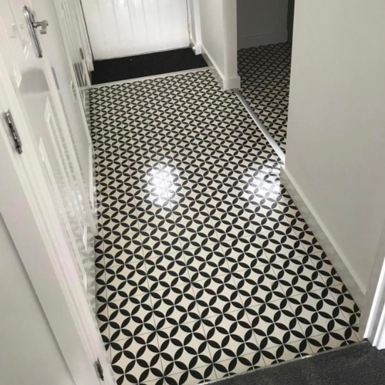 Patterned vinyl flooring in a hallway
